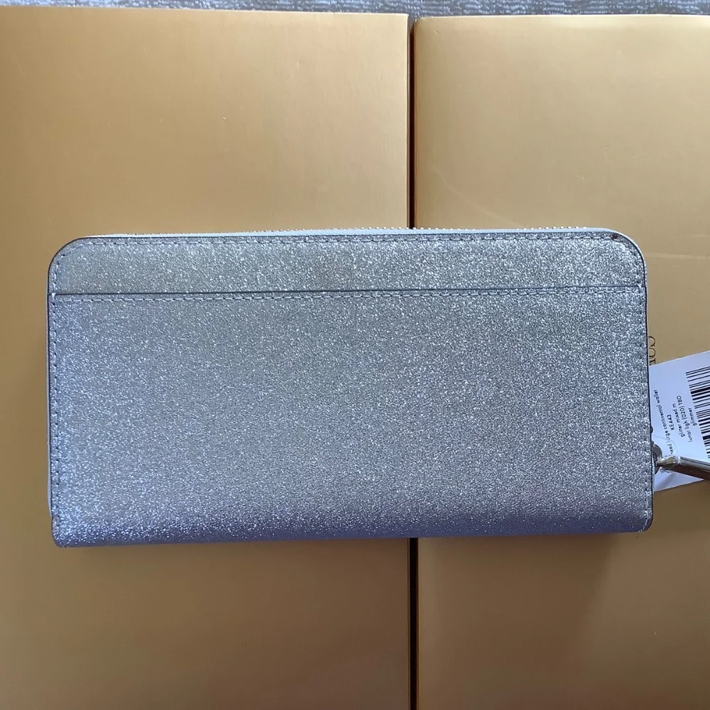 Kate Spade New York GLIMMER LARGE CONTINENTAL WALLET Silver